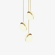 Crescent moon-shaped LED chandelier – Contemporary chic in acrylic and brass finish