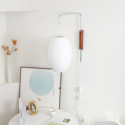 Vägglampa Nelson – Elegant modern design från 1950-talet med valnötsträ och metall