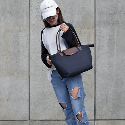 Sac à bandoulière Oxford élégant – Avec des détails en simili cuir raffinés