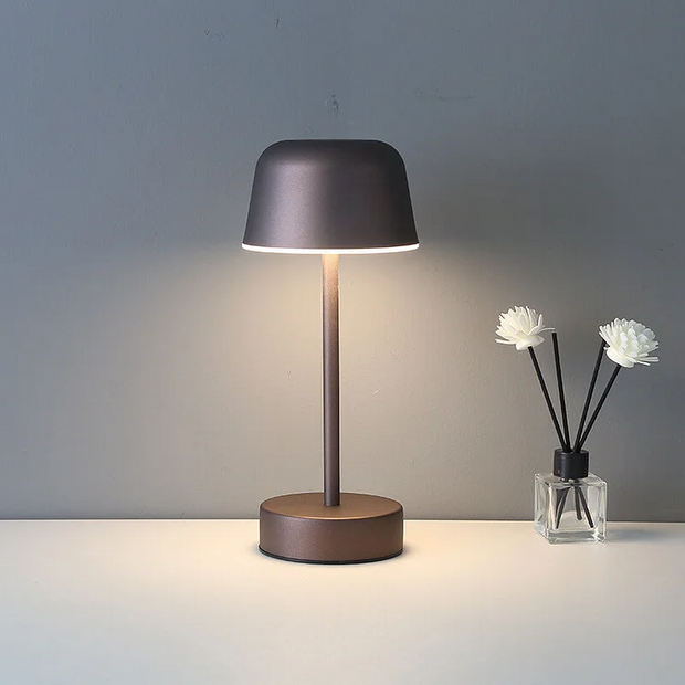 Elevate your space with the Prisma Pulse Flare table lamp - A stylish rechargeable lamp with customizable brightness