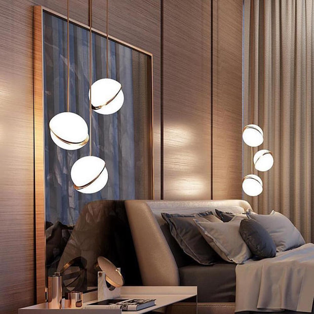 Crescent moon-shaped LED chandelier – Contemporary chic in acrylic and brass finish