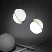 Crescent moon-shaped LED chandelier – Contemporary chic in acrylic and brass finish