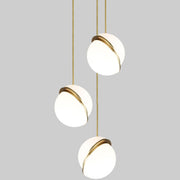 Crescent moon-shaped LED chandelier – Contemporary chic in acrylic and brass finish