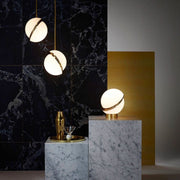 Crescent moon-shaped LED chandelier – Contemporary chic in acrylic and brass finish