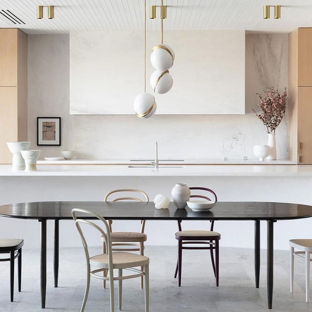 Crescent moon-shaped LED chandelier – Contemporary chic in acrylic and brass finish