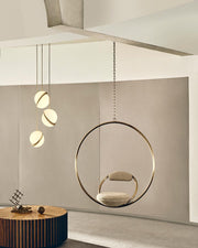 Crescent moon-shaped LED chandelier – Contemporary chic in acrylic and brass finish