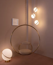 Crescent moon-shaped LED chandelier – Contemporary chic in acrylic and brass finish