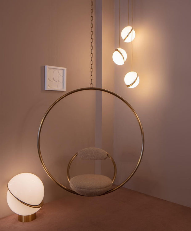 Crescent moon-shaped LED chandelier – Contemporary chic in acrylic and brass finish