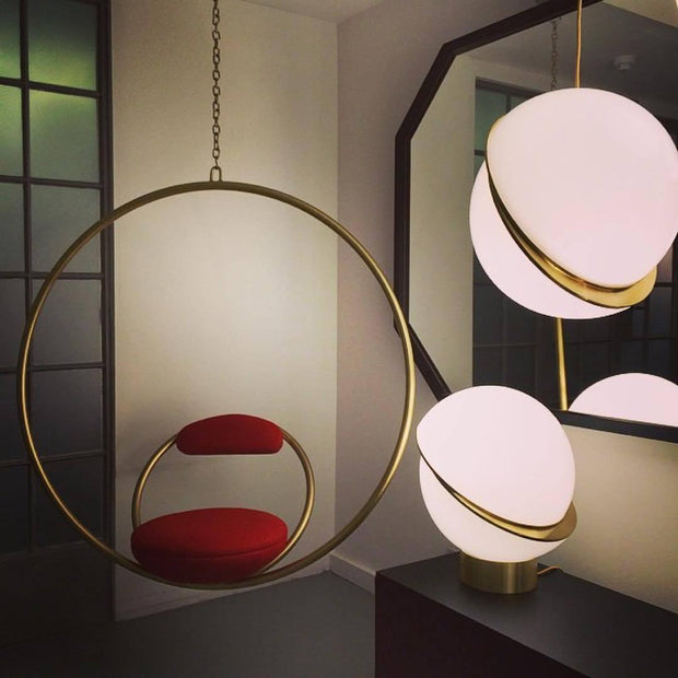 Crescent moon-shaped LED chandelier – Contemporary chic in acrylic and brass finish