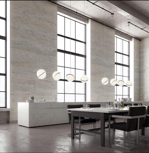 Crescent moon-shaped LED chandelier – Contemporary chic in acrylic and brass finish