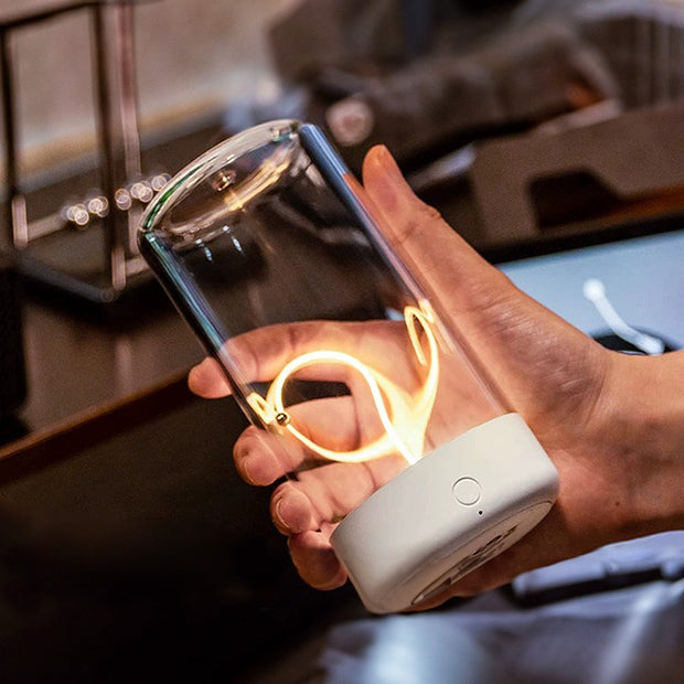 Elegant magnetic design wireless rechargeable LED table lamp