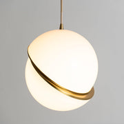 Crescent moon-shaped LED chandelier – Contemporary chic in acrylic and brass finish