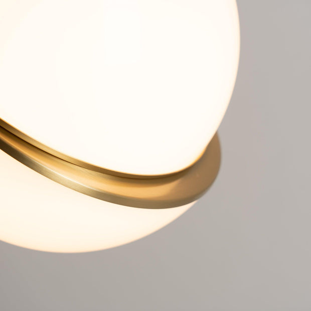 Crescent moon-shaped LED chandelier – Contemporary chic in acrylic and brass finish