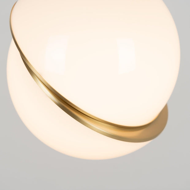 Crescent moon-shaped LED chandelier – Contemporary chic in acrylic and brass finish