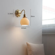 Elevate your space with our beautiful brass and ceramic wall sconce – A touch of classic elegance for timeless interiors