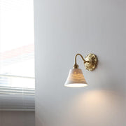 Elevate your space with our beautiful brass and ceramic wall sconce – A touch of classic elegance for timeless interiors