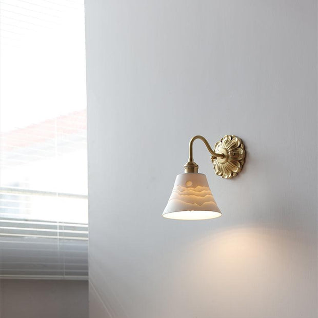 Elevate your space with our beautiful brass and ceramic wall sconce – A touch of classic elegance for timeless interiors