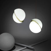 Crescent moon-shaped LED chandelier – Contemporary chic in acrylic and brass finish