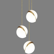 Crescent moon-shaped LED chandelier – Contemporary chic in acrylic and brass finish