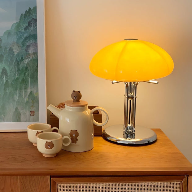 Elegantly designed Bauhaus table lamp by Pilz – Chic fusion of glass and metal with warm amber lampshade