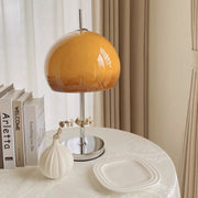 Elegantly designed Bauhaus table lamp by Pilz – Chic fusion of glass and metal with warm amber lampshade