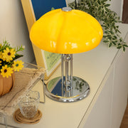 Elegantly designed Bauhaus table lamp by Pilz – Chic fusion of glass and metal with warm amber lampshade