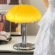 Elegantly designed Bauhaus table lamp by Pilz – Chic fusion of glass and metal with warm amber lampshade