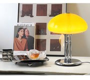 Elegantly designed Bauhaus table lamp by Pilz – Chic fusion of glass and metal with warm amber lampshade
