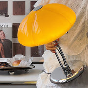 Elegantly designed Bauhaus table lamp by Pilz – Chic fusion of glass and metal with warm amber lampshade