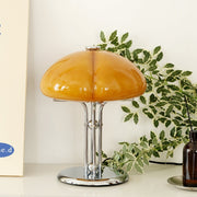 Elegantly designed Bauhaus table lamp by Pilz – Chic fusion of glass and metal with warm amber lampshade
