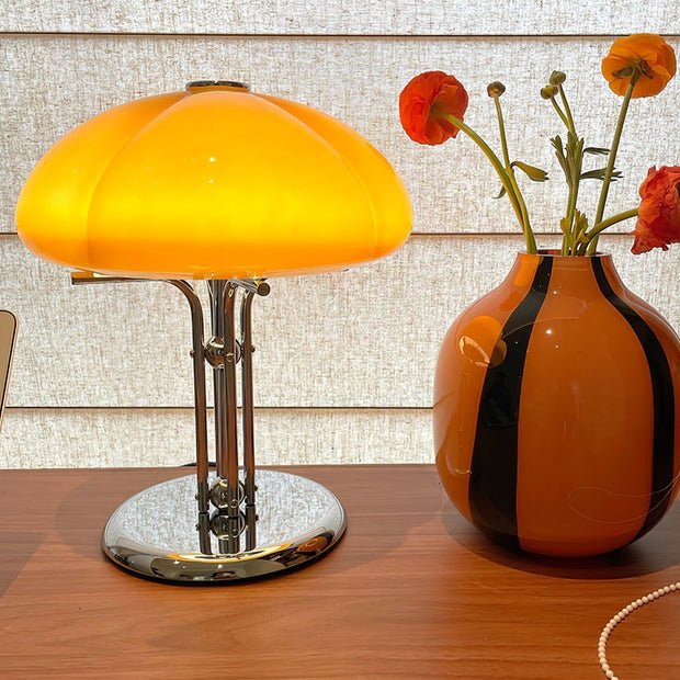 Elegantly designed Bauhaus table lamp by Pilz – Chic fusion of glass and metal with warm amber lampshade