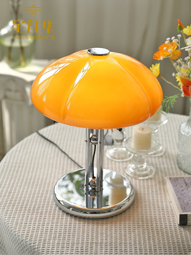 Elegantly designed Bauhaus table lamp by Pilz – Chic fusion of glass and metal with warm amber lampshade