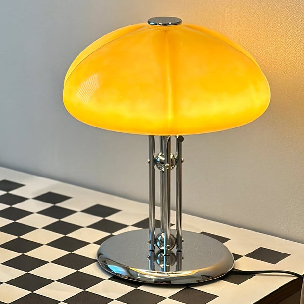 Elegantly designed Bauhaus table lamp by Pilz – Chic fusion of glass and metal with warm amber lampshade