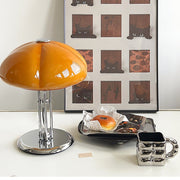 Elegantly designed Bauhaus table lamp by Pilz – Chic fusion of glass and metal with warm amber lampshade