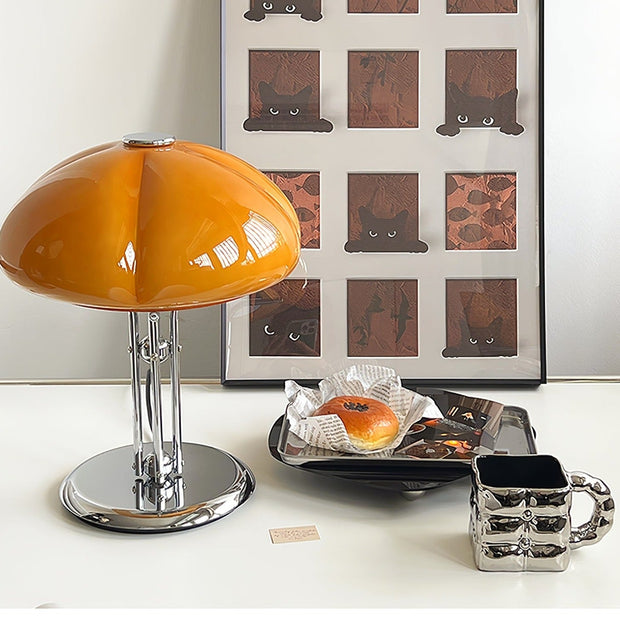 Elegantly designed Bauhaus table lamp by Pilz – Chic fusion of glass and metal with warm amber lampshade