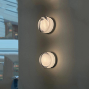 Elegant round LED wall sconce – Warm ambiance with Mylk glass diffuser for living room and bedroom decoration