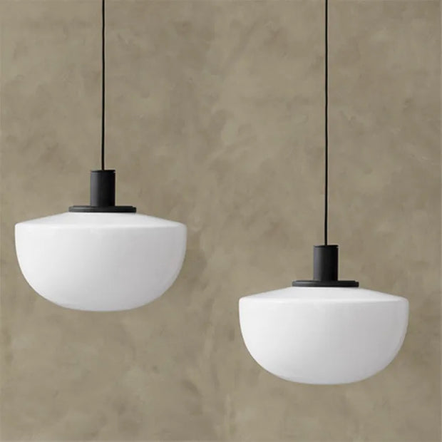 Elegant globe glass pendant - Chic metal and glass design perfect for dining and kitchen spaces