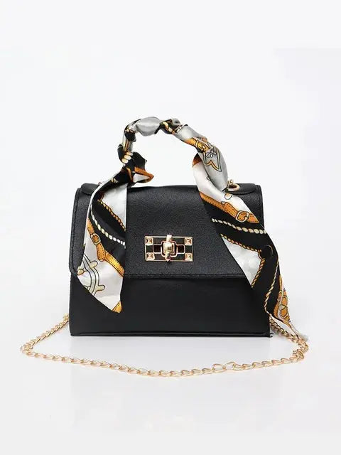 Women's Brown Leather Handbag with Silk Scarf and Gold Details – Timeless and Chic Elegance