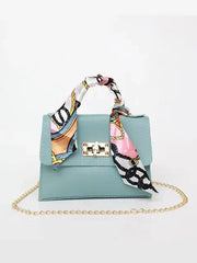 Women's Brown Leather Handbag with Silk Scarf and Gold Details – Timeless and Chic Elegance