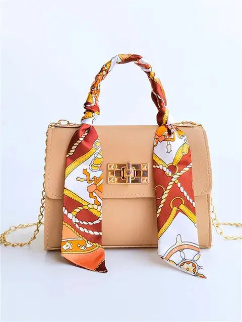 Women's Brown Leather Handbag with Silk Scarf and Gold Details – Timeless and Chic Elegance
