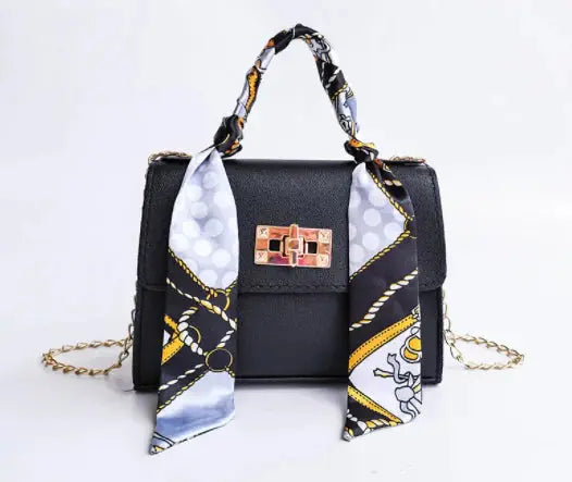 Women's Brown Leather Handbag with Silk Scarf and Gold Details – Timeless and Chic Elegance