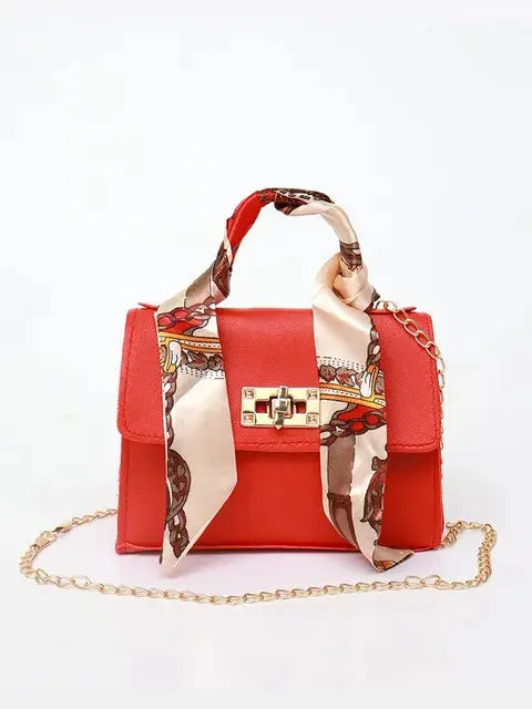 Women's Brown Leather Handbag with Silk Scarf and Gold Details – Timeless and Chic Elegance
