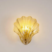 Wall sconce in brass and glass with a sleek design - Contemporary LED lighting with an artistic touch
