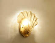 Wall sconce in brass and glass with a sleek design - Contemporary LED lighting with an artistic touch