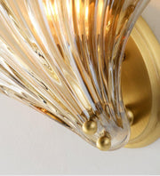 Wall sconce in brass and glass with a sleek design - Contemporary LED lighting with an artistic touch