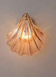 Wall sconce in brass and glass with a sleek design - Contemporary LED lighting with an artistic touch