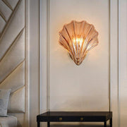 Wall sconce in brass and glass with a sleek design - Contemporary LED lighting with an artistic touch