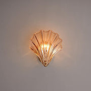 Wall sconce in brass and glass with a sleek design - Contemporary LED lighting with an artistic touch