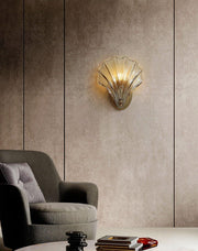 Wall sconce in brass and glass with a sleek design - Contemporary LED lighting with an artistic touch