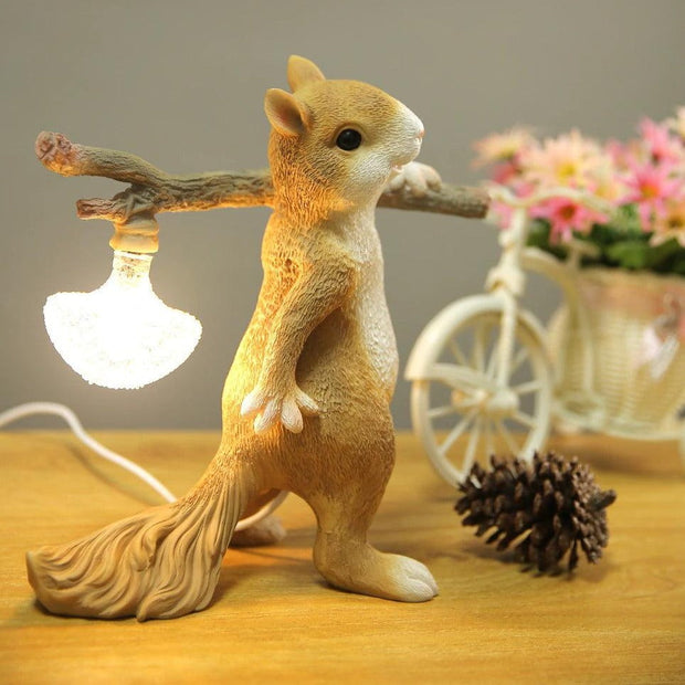 Charming LED squirrel table lamp – Stylish resin and glass accent for your space